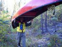 Portaging a modern light weight Canoe