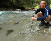 Drinking Purified Water from a Wilderness Stream