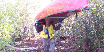 Portaging a modern light weight Canoe